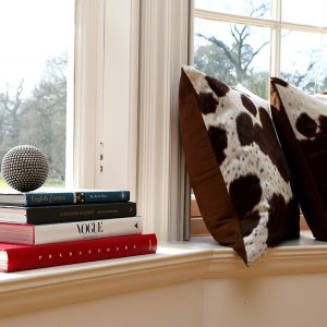 Brown and White Cowhide Cushions